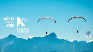 Paragliders flying above Mt Gerlitzen
